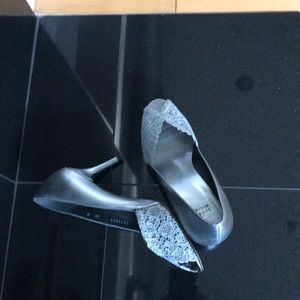 Stuart Weitzman Fabric and Leather Peep Toe Pump.